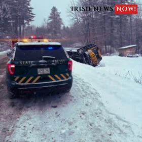 School bus in a ditch on a snowy road after a winter crash in Middlesex.